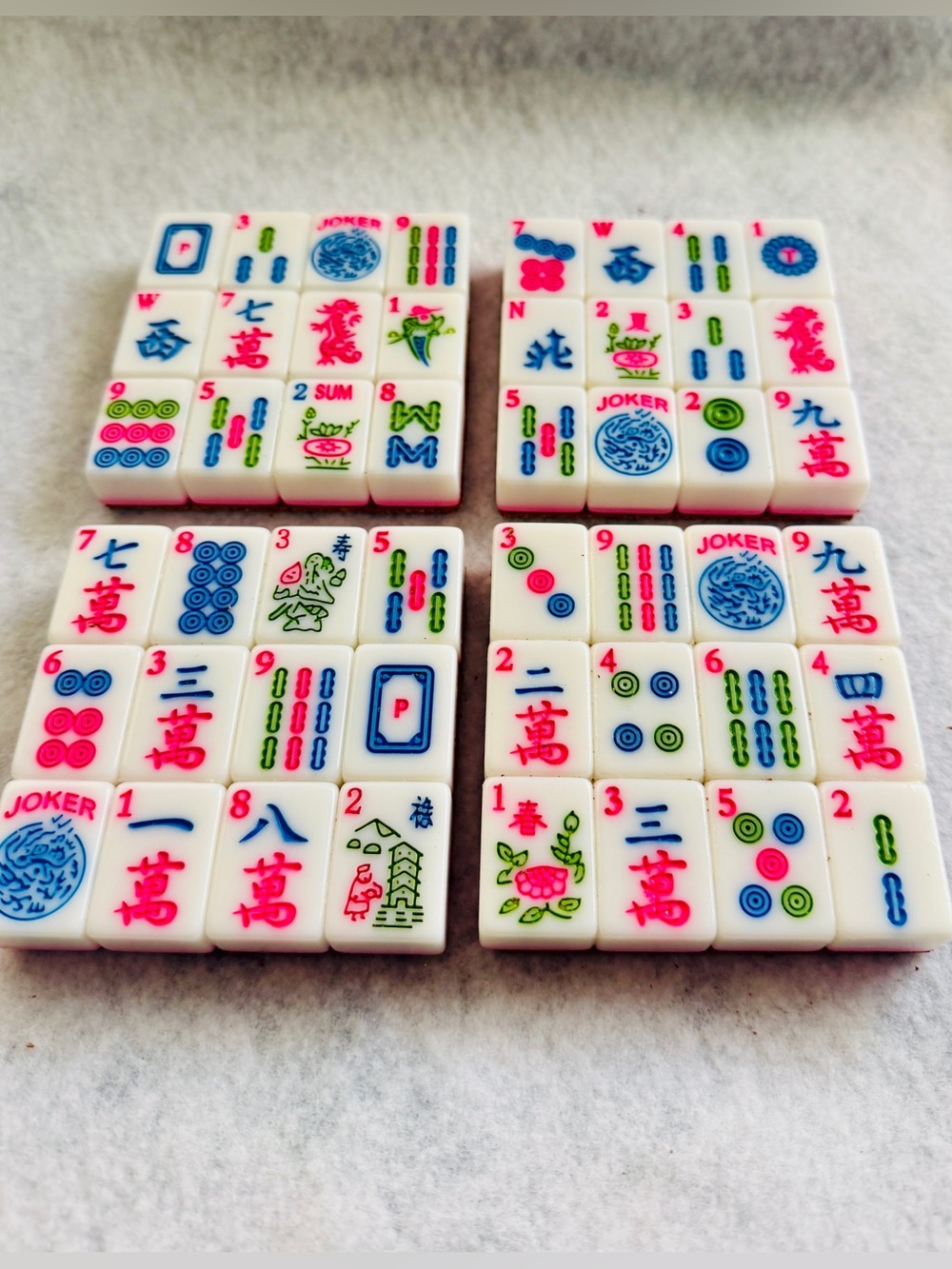 White Mahjong Tile Coaster Set with pink, blue and green accents